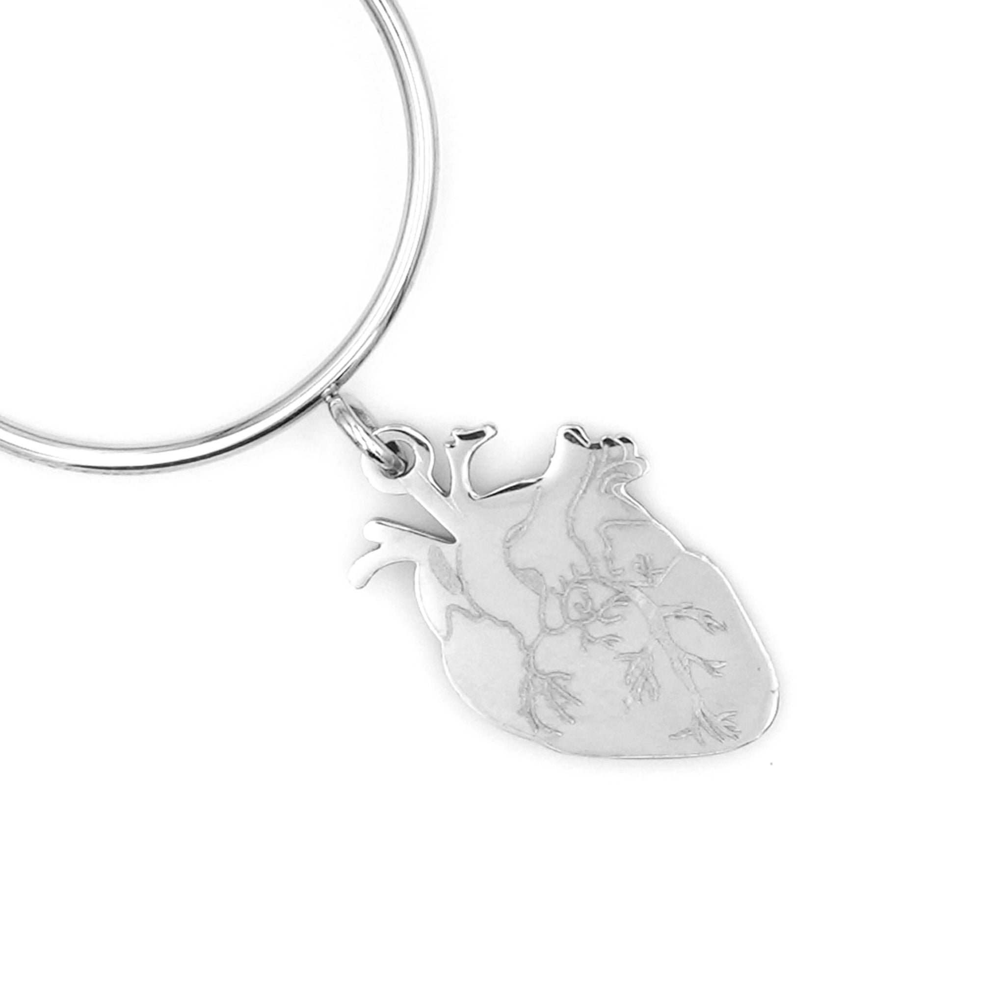 Anello in Acciaio con Ciondolo Cuore Anatomico
