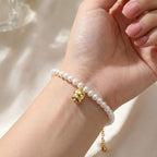 Bracciale di Perle con Campanellino In Acciaio Inossidabile