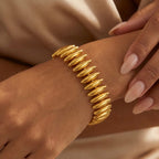 Bracciale Semirigido Spole Ovali Lisce Acciaio Inossidabile