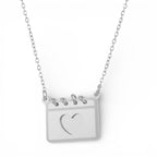 Collana Calendario Cuore Traforato In Acciaio Inossidabile