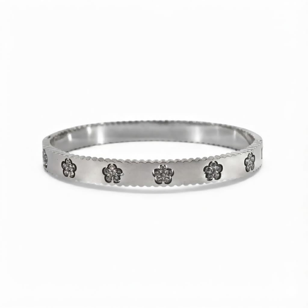 Bracciale Rigido Sottile con Fiori in Zirconi e Profilo Zigrinato In Acciaio Inossidabile