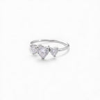 Anello Solitario Trilogy con Tre Zirconi a Cuore In Acciaio Inossidabile