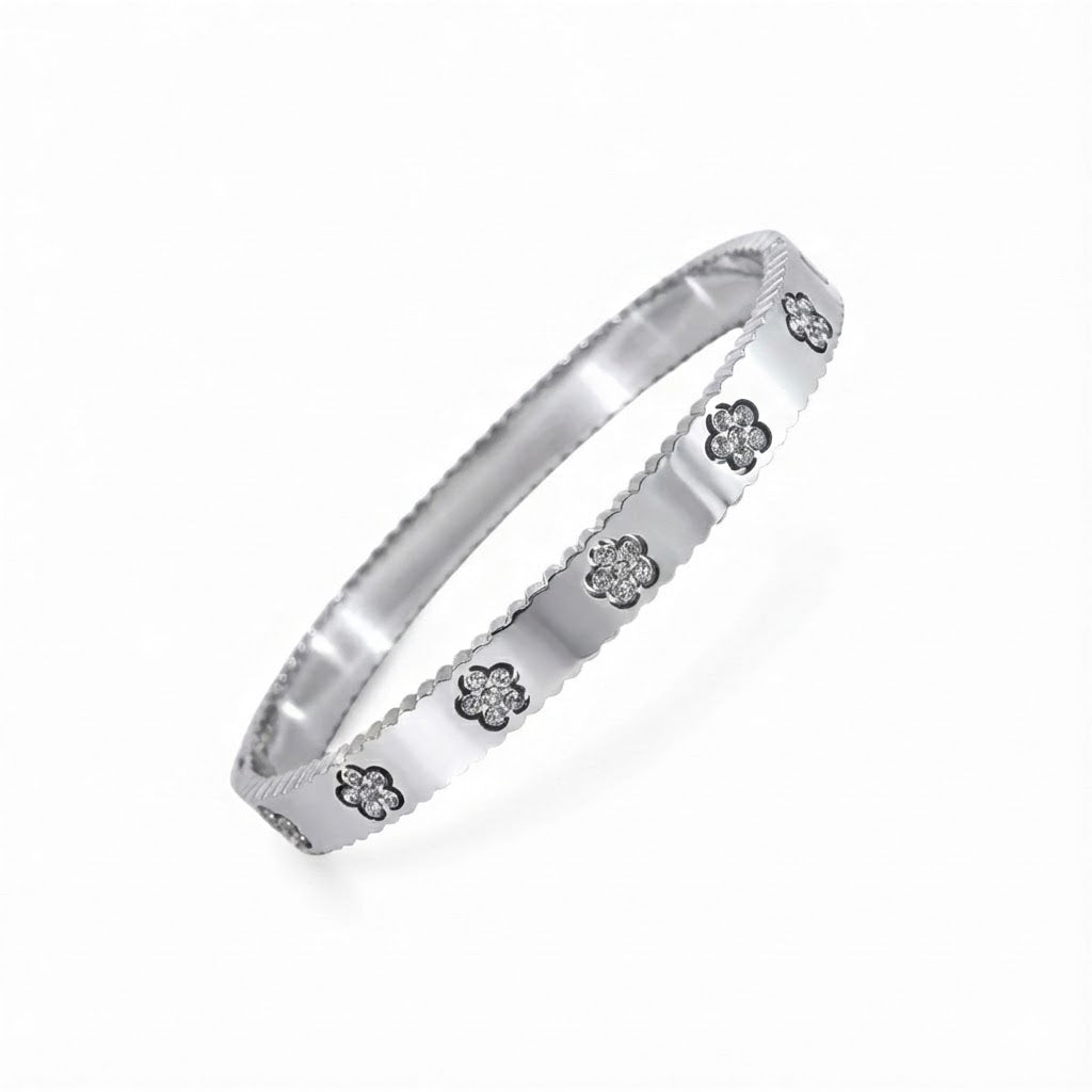 Bracciale Rigido Sottile con Fiori in Zirconi e Profilo Zigrinato in Acciaio Inossidabile