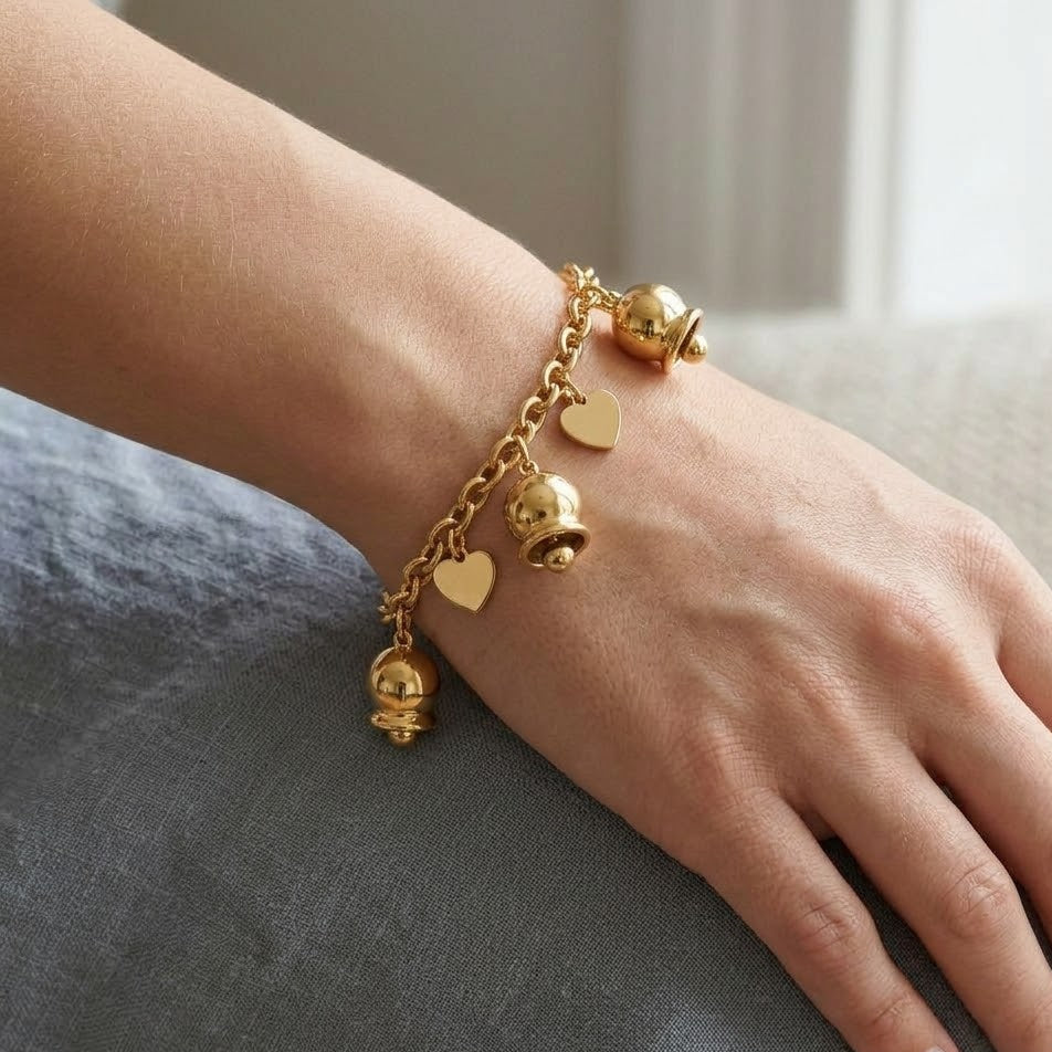 Bracciale Melodia d'Amore con Campanelle e Cuori in Acciaio Inossidabile
